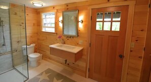 Bathtub, hair dryer, towels, soap