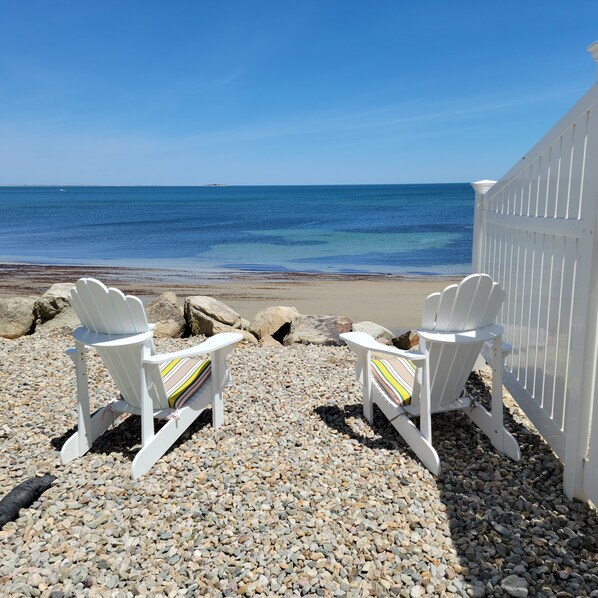 On the beach, sun-loungers, beach towels
