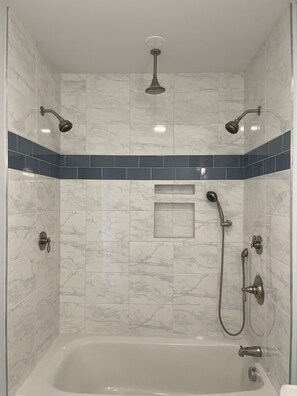 Combined shower/tub, hair dryer, towels, soap