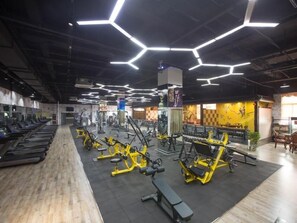 Stay fit and active in our well-equipped gym, featuring treadmills, weight machines, and free weights.