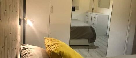 1 bedroom, desk, iron/ironing board, travel cot