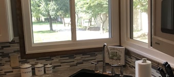 This home is located in beautiful Parke County, a rustic and charming setting.