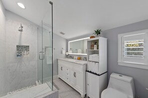Shower, hair dryer, towels, soap