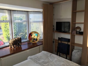 1 dormitorio, tabla de planchar con plancha, wifi gratis y ropa de cama