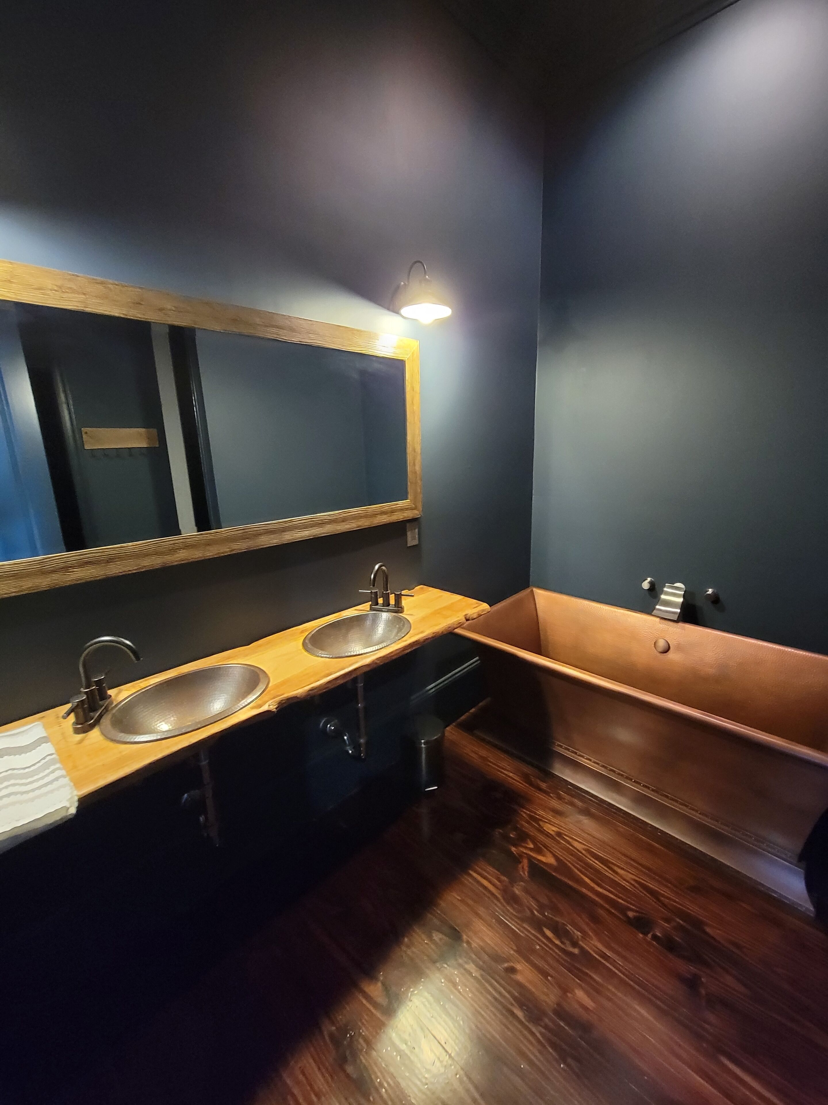 Bathtub, hair dryer, towels, soap