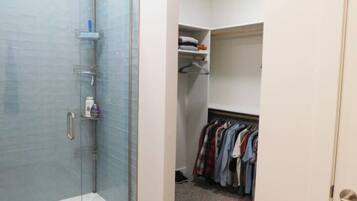 Combined shower/tub, hair dryer, towels, soap