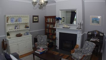 Smart TV, fireplace, books