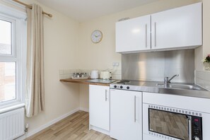 Apartamento superior, baño privado (Flat 3) | Cocina compartida