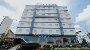 A multi-story hotel with a prominent sign reading "ARTE HOTEL" at the top. - Arte Yogyakarta (Yogyakarta)