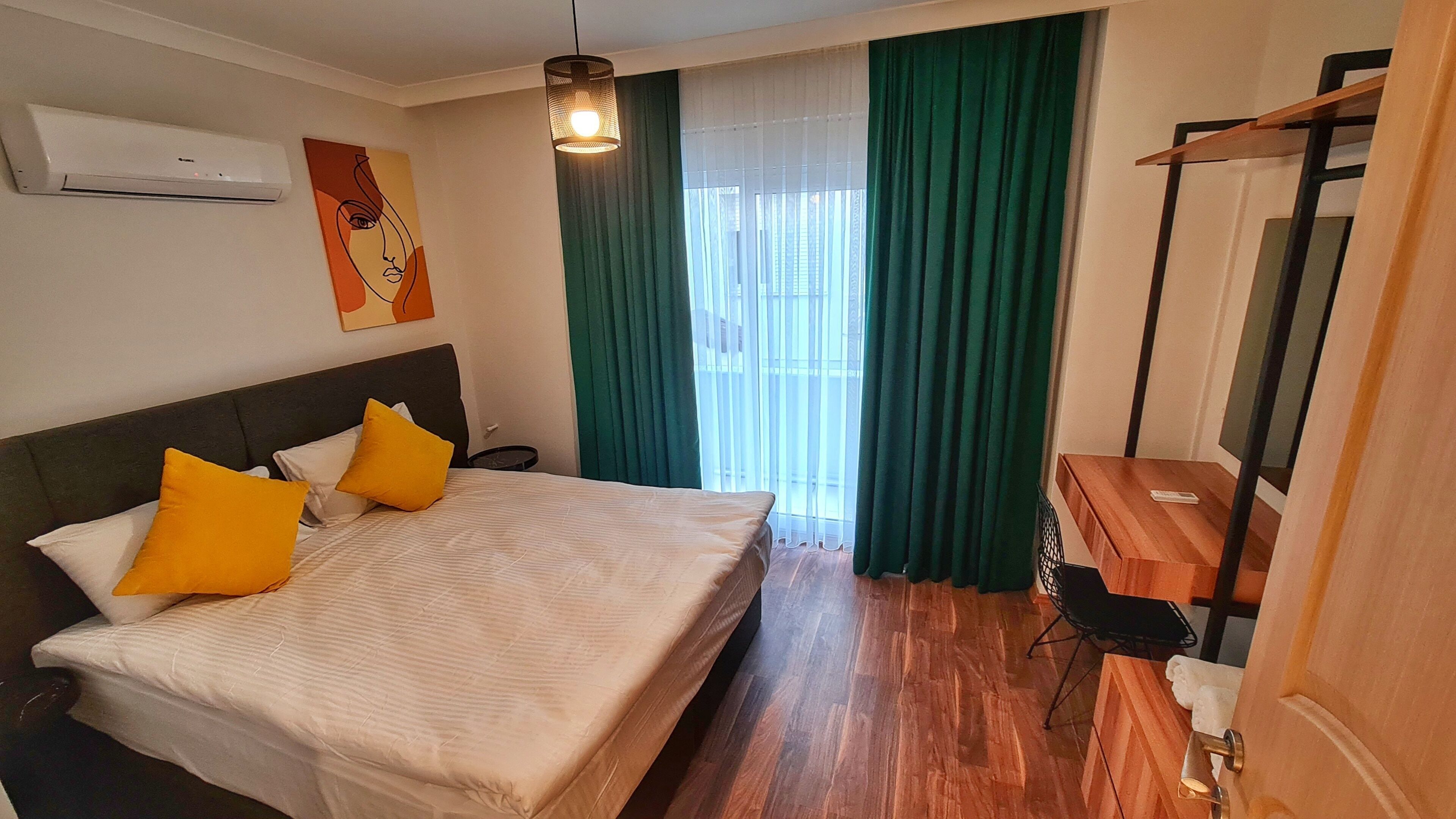 2 bedrooms, premium bedding, in-room safe, desk