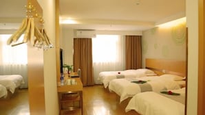 A hotel room with two beds, a desk, and an air conditioning unit. - Greentree Inn Beijing Fangshan District Jingzhou Road Magezhuang Subway Station Express Hotel (Fangshan)