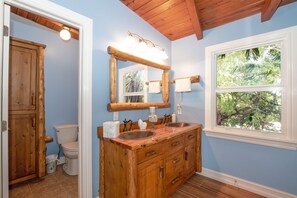 Bathtub, hair dryer, towels, soap