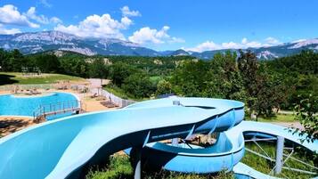 2 outdoor pools, open 10:00 AM to 7:00 PM, pool loungers