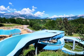 2 outdoor pools, open 10:00 AM to 7:00 PM, pool loungers