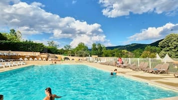 Outdoor pool, open 10:00 AM to 8:00 PM, pool loungers