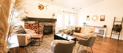 Smart TV, fireplace, books