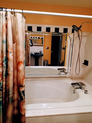 Combined shower/tub, hair dryer, towels, soap