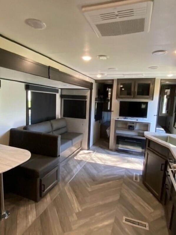 Standard Cottage | Living area | 32-inch Smart TV with satellite channels, TV - Bonanza Camping Resort (Wisconsin Dells)