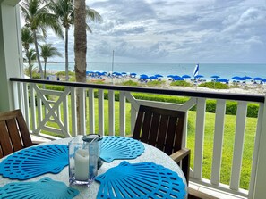 Outdoor dining - Spectacular Beachfront Condo, Ocean Views of Grace Bay, Suite #123 (Providenciales)