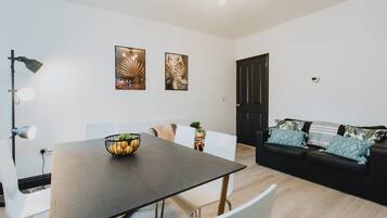 Townhome | Living area | 32-inch flat-screen TV with digital channels, TV