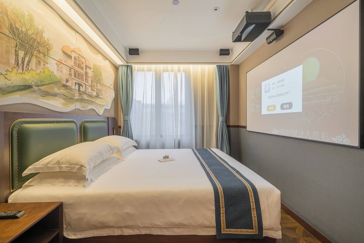 Signature Room | Blackout curtains, iron/ironing board, bed sheets