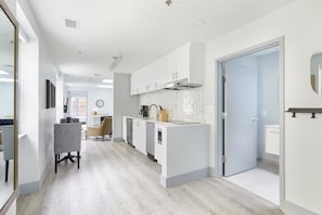 Apartment, 1 Bedroom | Living area | 42-inch flat-screen TV with digital channels, TV