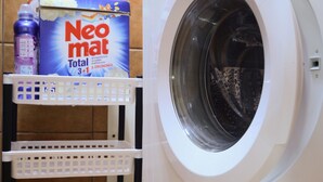 A front-loading washing machine with a control panel and a detergent dispenser. - Nautilus Villa with private pool (Hersonissos)