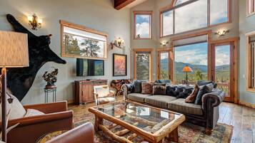 Smart TV, fireplace, foosball, books