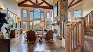 Smart TV, fireplace, foosball, books