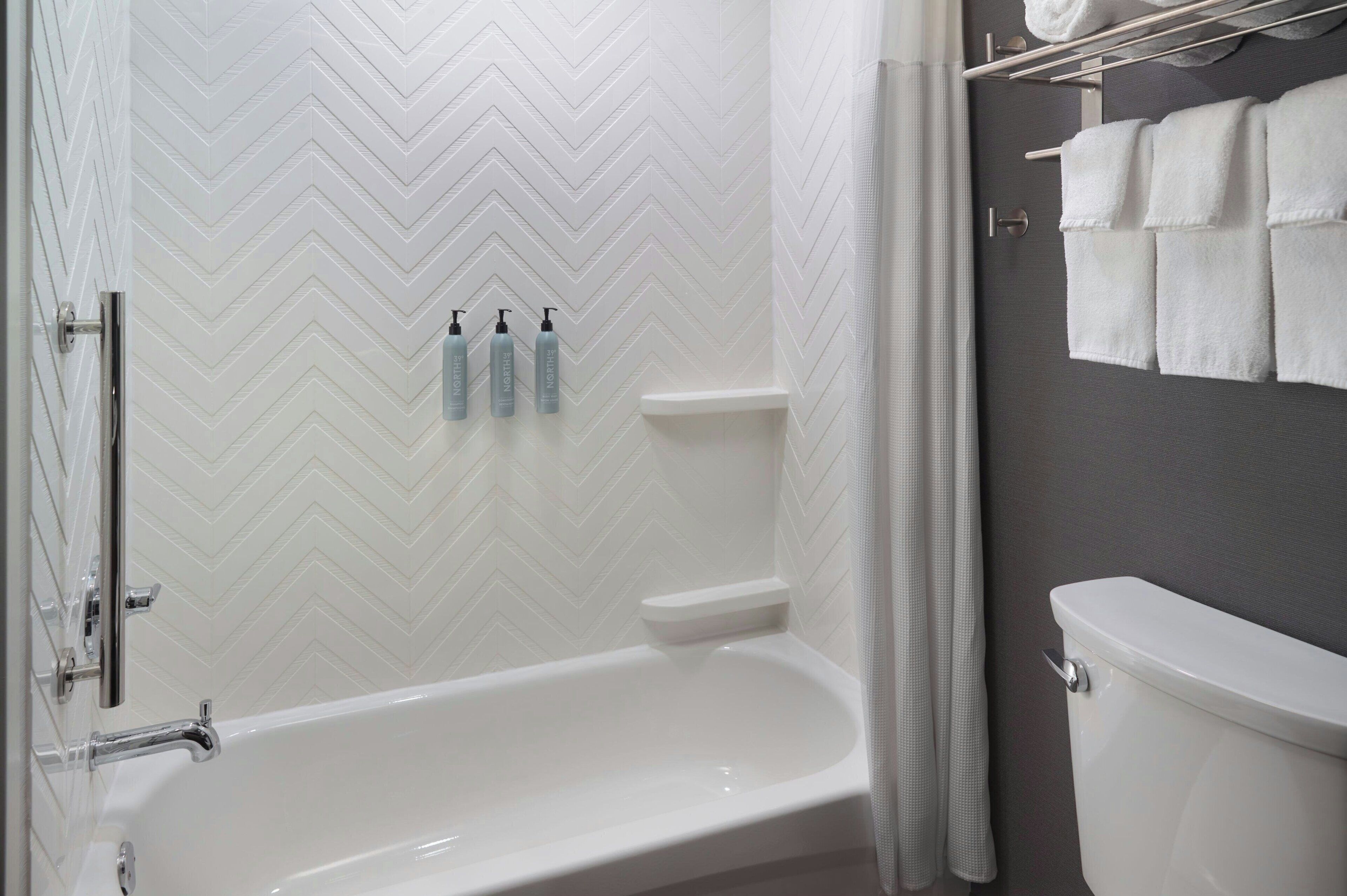 hair dryer, towels, soap, shampoo