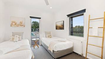 6 bedrooms, premium bedding, laptop workspace, iron/ironing board