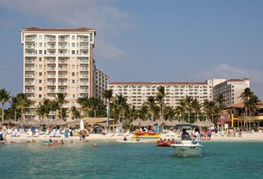 On the beach - Fabulous one bedroom with balcony and blue-green ocean view in warm/fun Aruba. (Palm Beach)