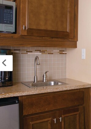 Fridge, microwave, coffee/tea maker, toaster