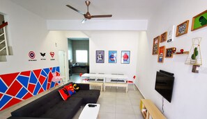 The Woodz x Buddy Heroes | Living area | 39-inch flat-screen TV with cable channels, TV - The Woodz Homestay - 2 Storey House (Tanah Rata)