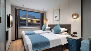 Deluxe Studio, 2 Twin Beds | Down comforters, desk, laptop workspace, iron/ironing board