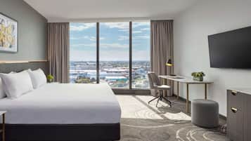 Deluxe King Corner | 1 bedroom, premium bedding, pillowtop beds, in-room safe