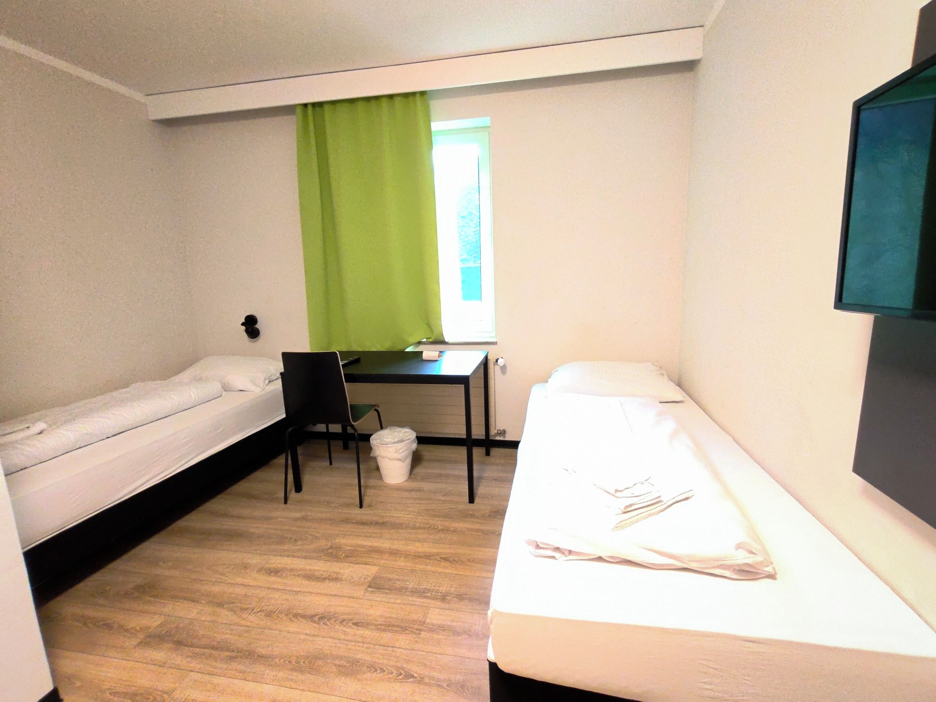 Twin Room | Desk, blackout drapes, free WiFi, bed sheets