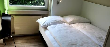 Desk, blackout curtains, free WiFi, bed sheets