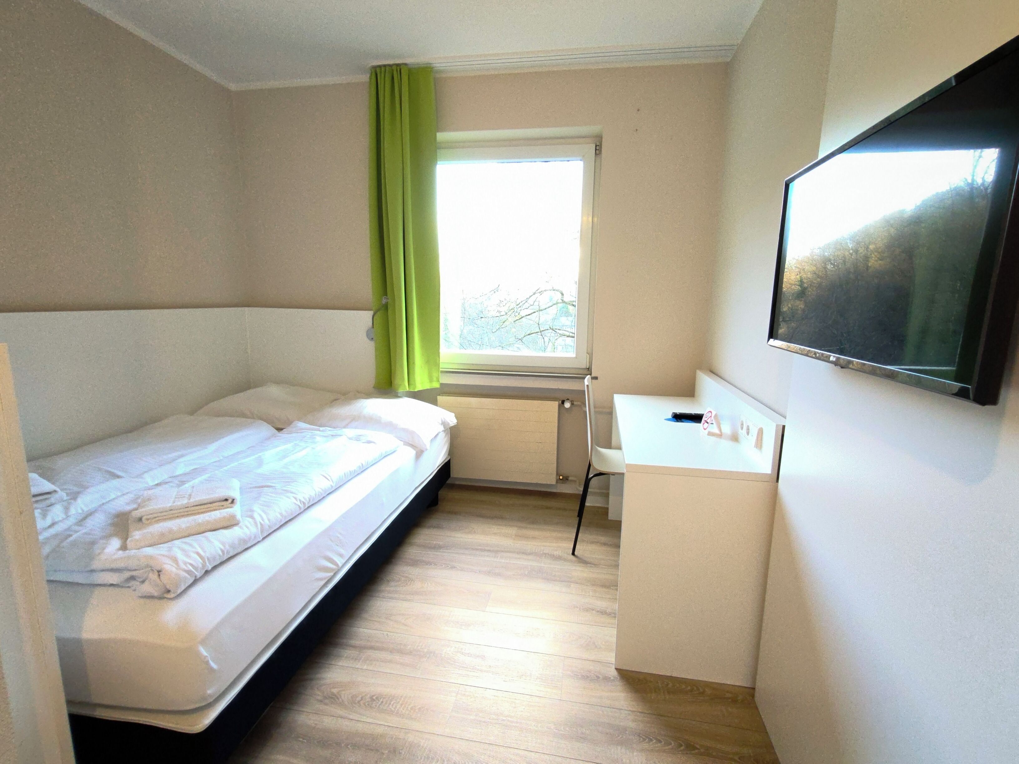 Basic Double Room | Desk, blackout drapes, free WiFi, bed sheets