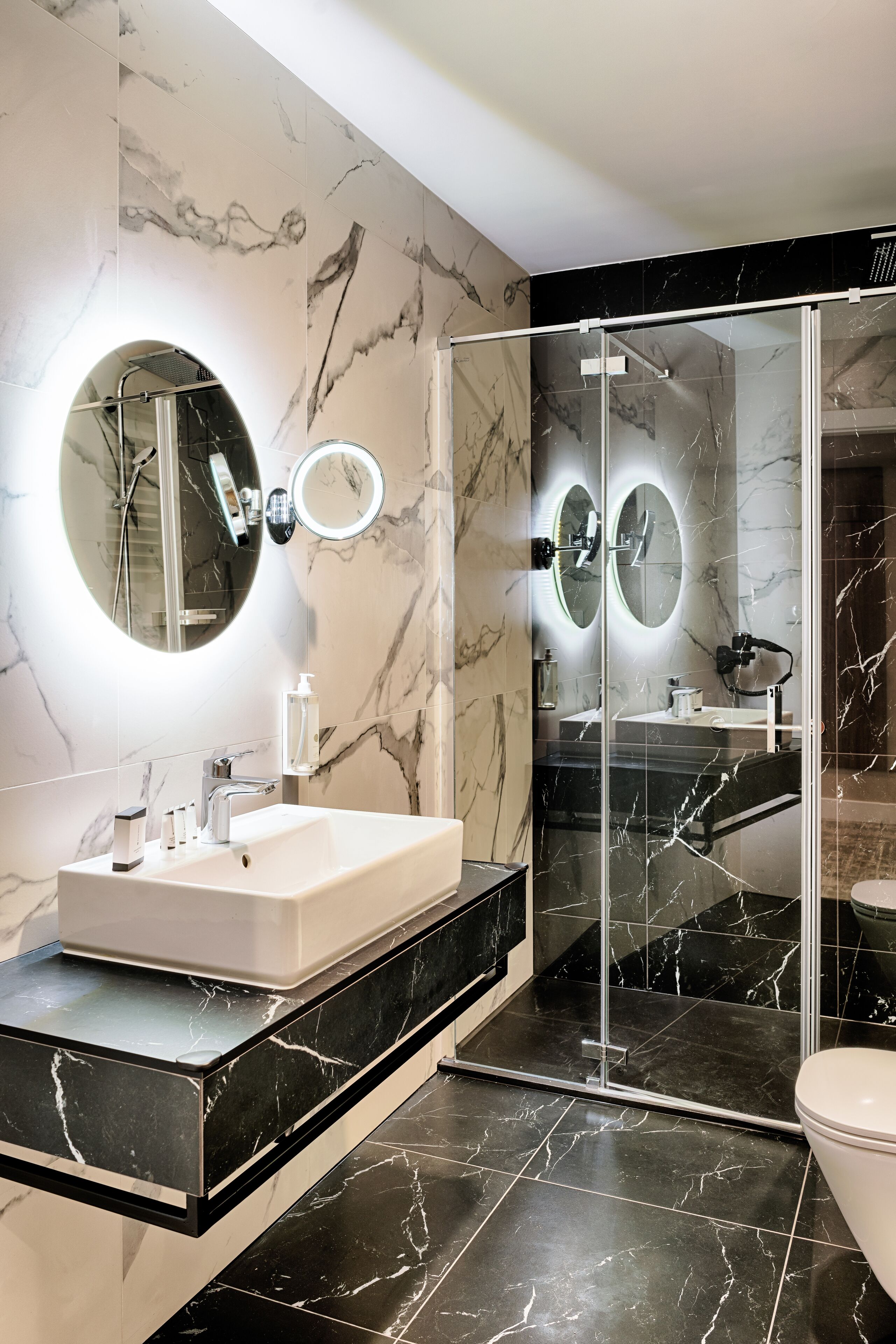 shower, hair dryer, bathrobes, towels