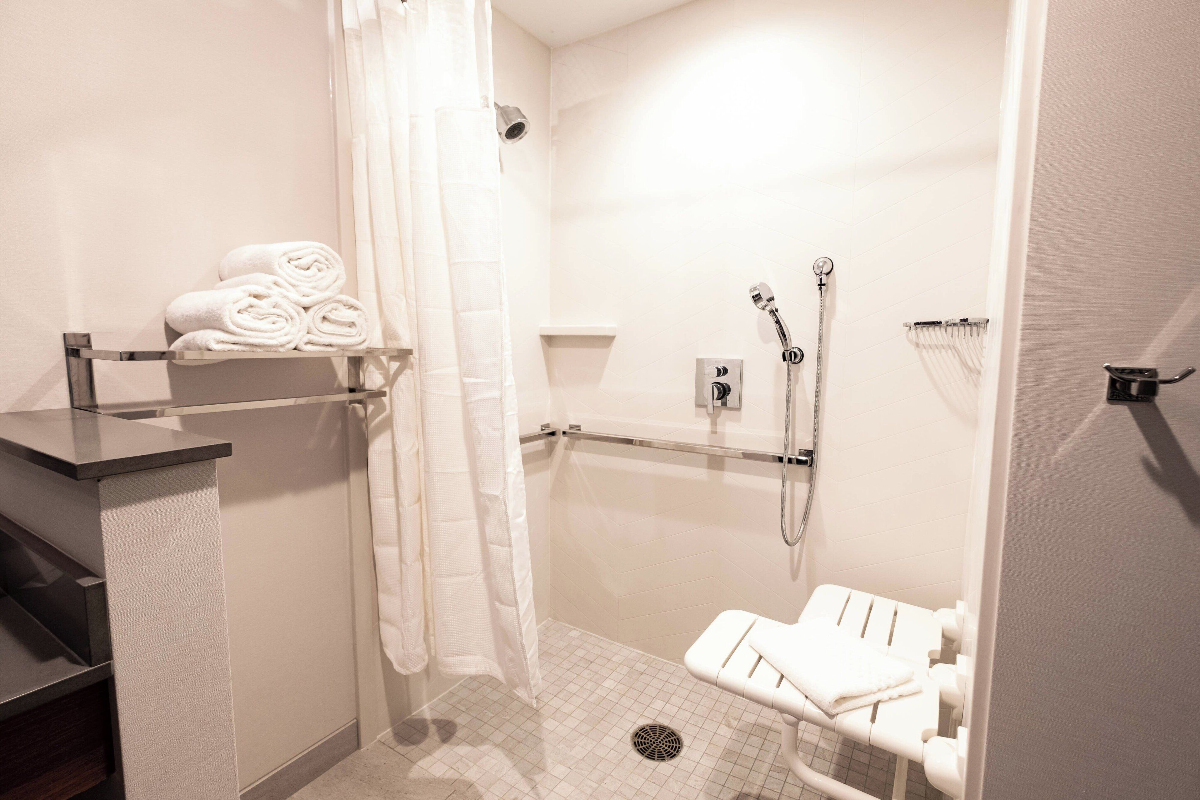 combined shower/bathtub, free toiletries, hair dryer, towels