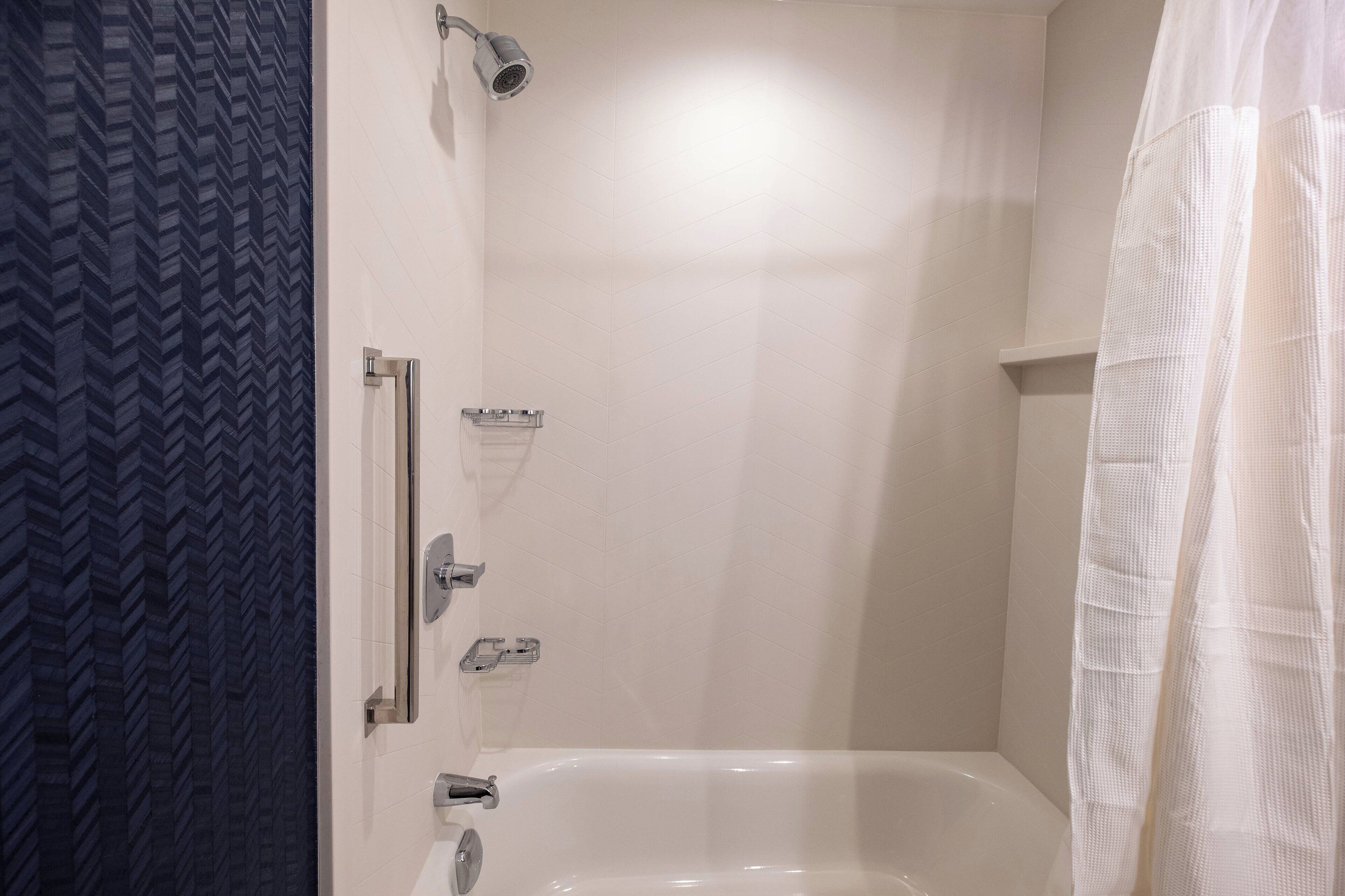 combined shower/bathtub, free toiletries, hair dryer, towels