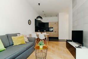 Appartement classique | Salle de séjour | Téléviseur à écran plat