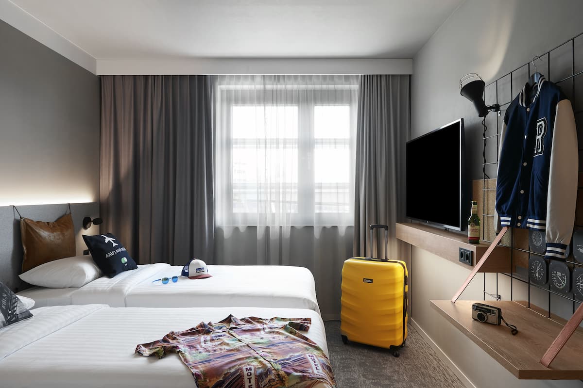 room, 2 single beds, non smoking (moxy sleeper) | 1 bedroom, desk, laptop workspace, free cots/infant beds