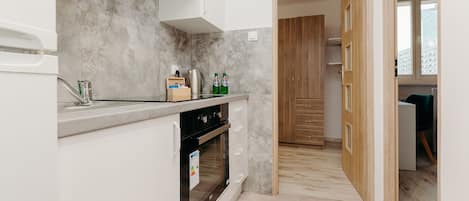 Apartment | Private kitchen | Full-size fridge, microwave, oven, stovetop