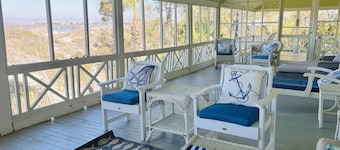 Large, Classic Beachfront House with Wrap-Around Porch by Tybee Cottages