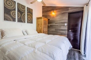 1 bedroom, desk, iron/ironing board, travel crib