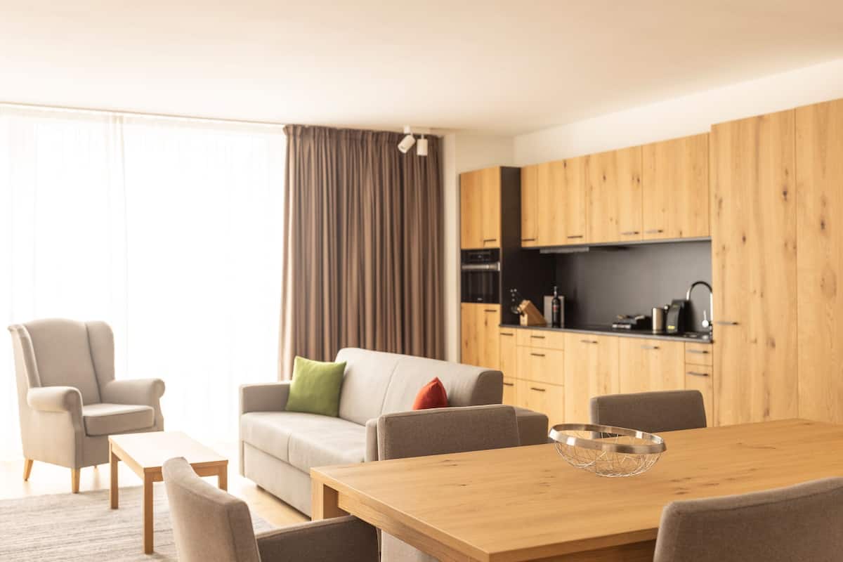 Executive Apartment, 3 Bedrooms, Balcony | Living area | Flat-screen TV