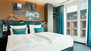 Egyptian cotton sheets, premium bedding, down comforters, in-room safe