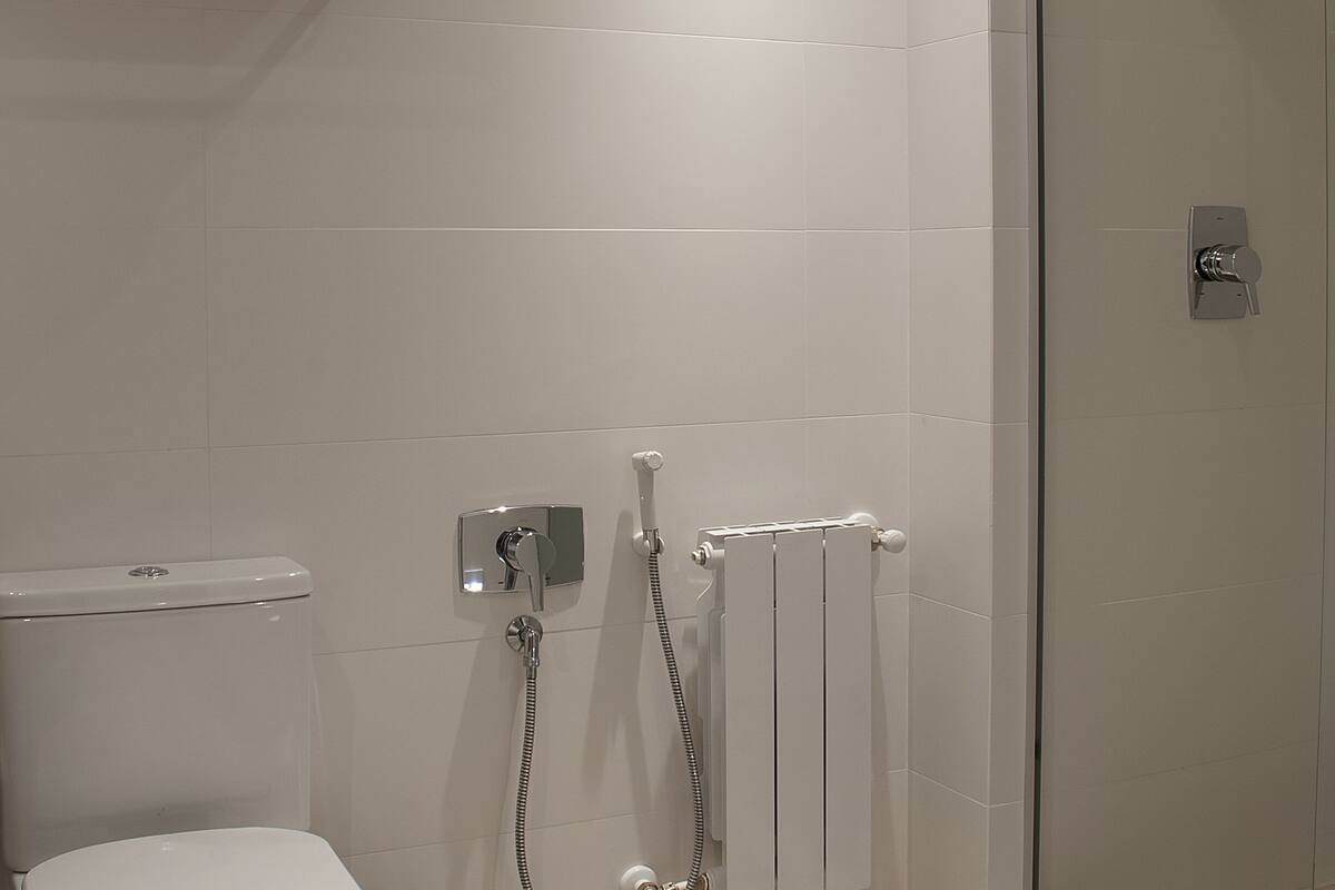 hair dryer, bathrobes, towels